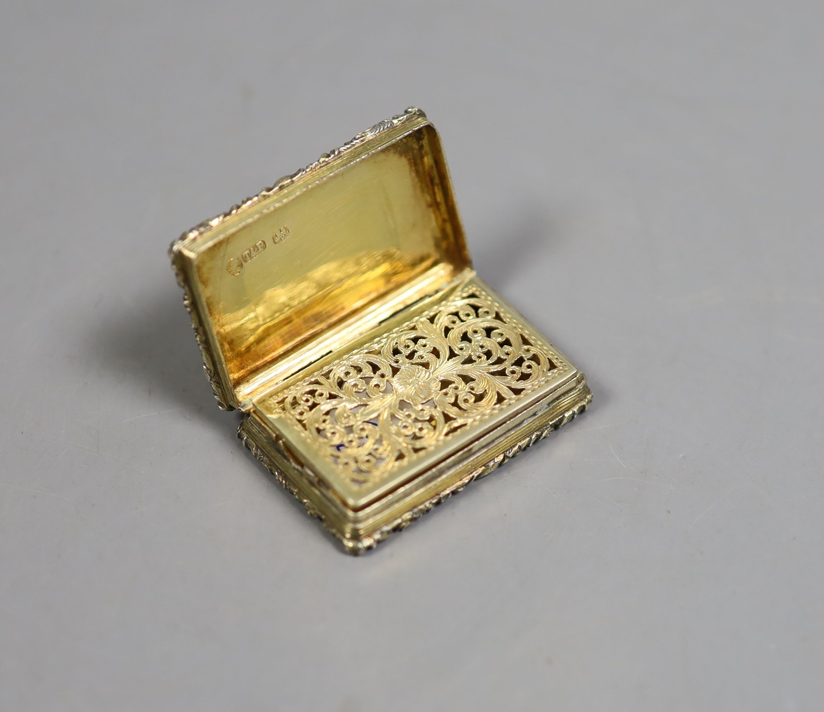 A George IV silver gilt rectangular vinaigrette, Taylor & Perry, Birmingham, 1832?, 42mm.